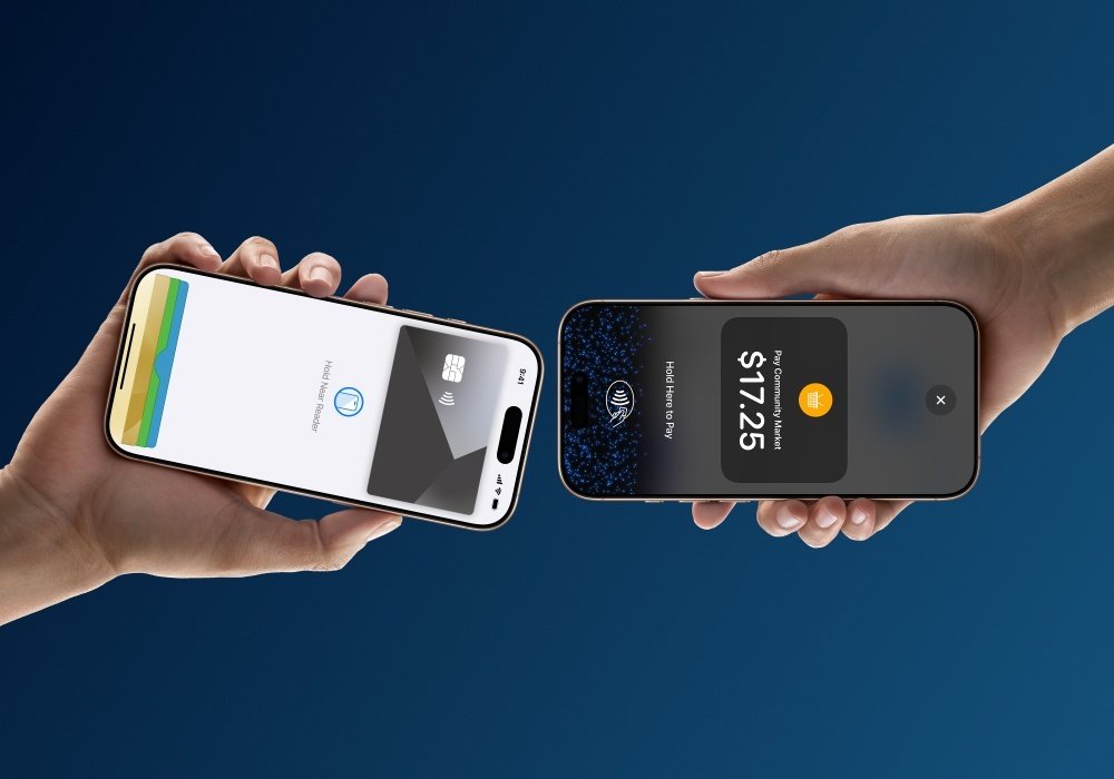 Two phones completing a tap-to-pay transaction